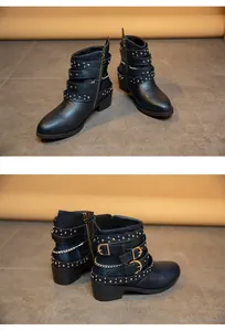 Detail shots of black chunky heel Martin boots with multiple buckles, studs and silver chains