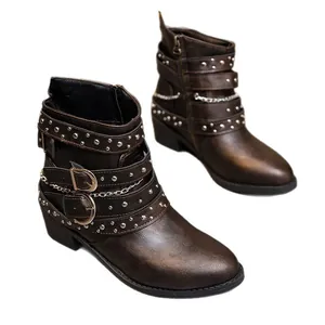 Brown punk style ankle boots with silver rivets and buckle straps