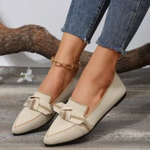Elegant pointed-toe flying weave flats for women featuring a stylish bow-knot and knit texture