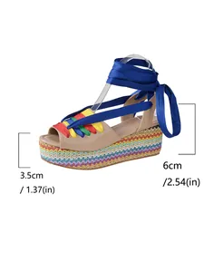 Detail showing 6cm heel and 3.5cm platform height of rainbow wedge sandals