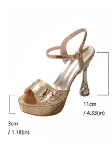 Detail of gold platform sandal showing 11cm wine glass heel and 3cm platform height