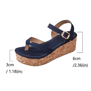 Sandales compensées bleues pour femmes avec semelle en liège et bride à boucle
