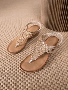 Elegant Bohemian thong sandals featuring intricate hand-beaded rhinestones and elastic straps