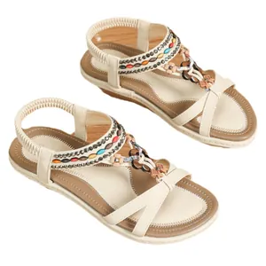 Bohemian style flat sandals for women featuring colorful beads and crisscross straps