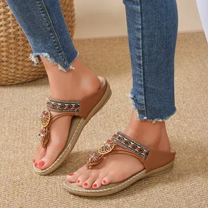 Bohemian style flat thong sandals for women featuring colorful rhinestone flower decor