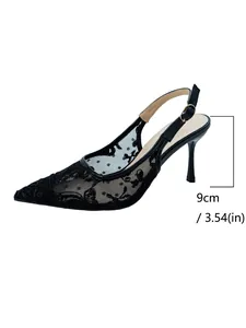Detailed view of the 9cm stiletto heel on black lace mesh pointed toe slingback sandals.