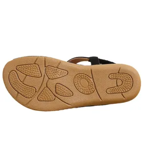 Detailed close-up view of the textured anti-slip sole on Bohemian flat thong sandals
