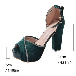 Elegant green velvet platform sandals featuring rhinestone trim and high block heels