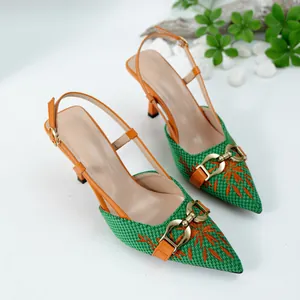 Stylish slingback high heels with green woven texture and orange embroidered patterns.