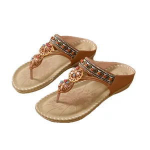 Elegant Bohemian ethnic style flat thong sandals for women with colorful beaded details