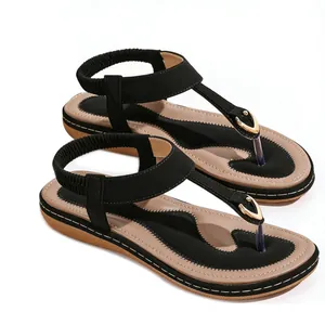Bohemian flat T-strap sandals for women with elastic ankle straps in black