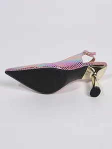 Detail view of pink iridescent snakeskin slingback with golden kitten heel