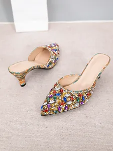 Detailed shot of multi-colored rhinestone pointed toe mules with 7cm kitten heel