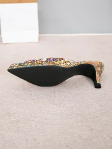 Detail view showing the non-slip sole and 7cm stiletto heel of the rhinestone wedding shoe.