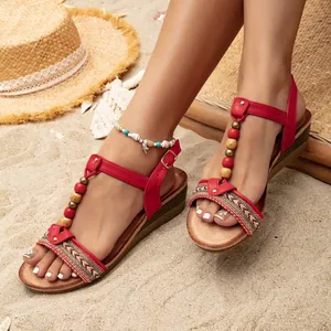 Stylish red bohemian wedge sandals for women featuring vintage beaded straps