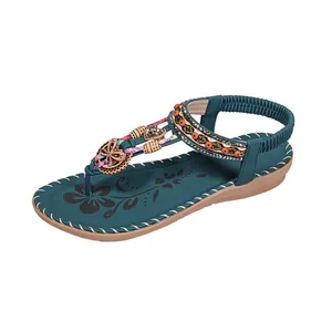 Bohemian flat thong sandals for women featuring colorful beads and butterfly charm detail