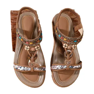 Bohemian ethnic flat sandals featuring handmade beads and decorative heart charms for summer
