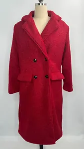 Detailed front view of a red double-breasted teddy fleece coat on a mannequin