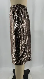 Detailed side view of a rose gold shimmery sequined bodycon skirt on a mannequin