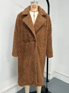 Premium long brown teddy coat with lapel collar and soft plush texture on mannequin
