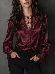 Elegant burgundy satin shirt with lace V-neck and puff sleeves for women, fall style.