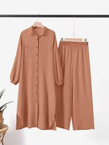 Two-piece terracotta ice silk set with long split shirt and wide-leg pants