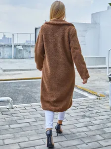 Stylish women's brown long-sleeve teddy faux fur coat with a lapel collar shown from behind