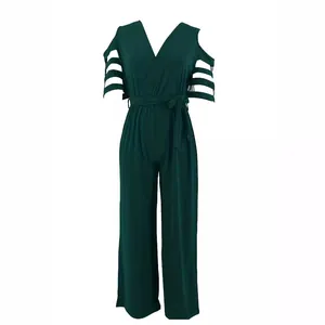 Elegante tuta intera verde scuro con scollo a V, spalle scoperte e cintura a vita alta