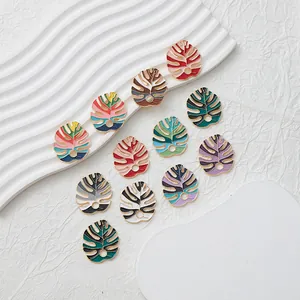 Set di 11 ciondoli a foglia di monstera in smalto colorato per gioielli fai da te