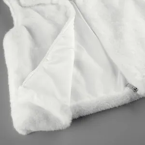 Close-up of a white faux mink fur vest showing the zipper and smooth satin lining details