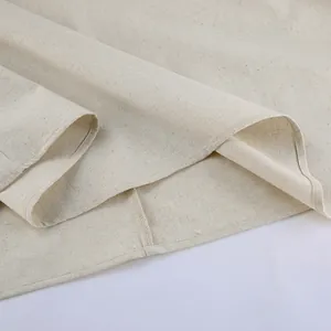 Detailed view showing the premium beige linen fabric texture and hem stitching of this French dress