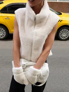 Stylish white faux fur vest for women with high collar and a front zip closure.