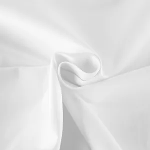 Close-up detail of smooth white twill fabric texture for windbreaker coat