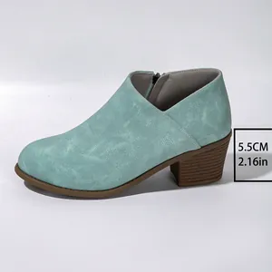 Women's stylish turquoise chunky heel ankle boots featuring 5.5cm heel and side zip closure