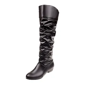Detailed side view of black slouchy knee-high boots featuring soft pleated leather and round toe