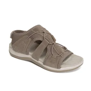 Detail view of breathable casual flat beach sandals for women in tan color.