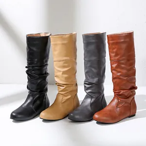 Stylish round-toe flat slouchy boots in four colors: black, tan, grey, and brown.