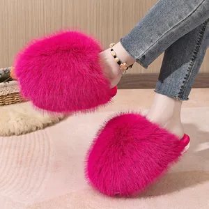Vibrant pink fluffy faux-fur slippers with closed-toe design for autumn and winter