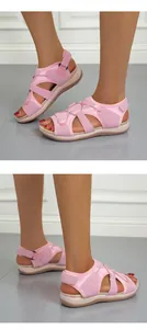 Close-up view of pink breathable casual sandals for women featuring adjustable straps