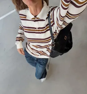 Full length view of vintage striped polo knit shirt with retro horizontal stripes