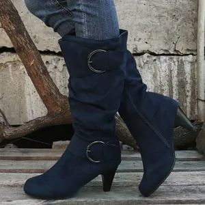 Elegant navy blue suede mid-calf boots with stylish high heels and buckle details