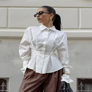 Elegant white cotton shirt with pleated waist and slim fit long sleeves for women