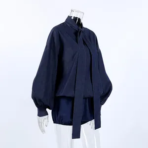 Side view detail of blue cotton denim set with puff sleeve shirt and matching shorts