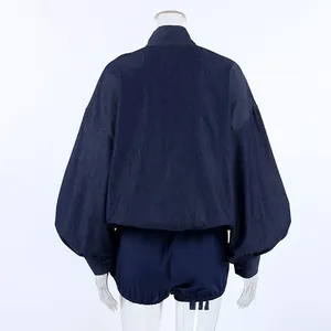 Back view of blue soft cotton denim set with puff sleeve shirt and matching shorts