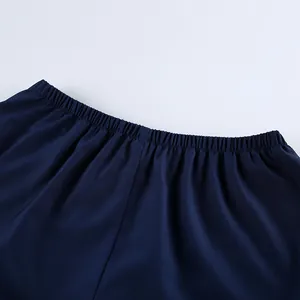 Close-up detail showing the elastic waistband on these dark blue soft denim shorts