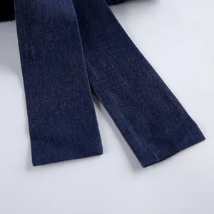 Detailed macro view of high-quality soft navy blue denim fabric texture and finishing