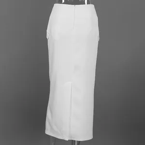 Rear view of high waist white maxi skirt showing back zipper and bottom slit detail.