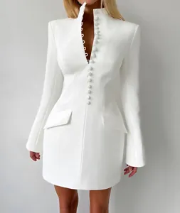 Elegant white long sleeve blazer dress with stand collar and button front details.