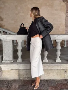 Elegant high waist white straight long skirt styled with a chic black leather blazer