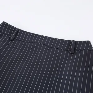 Close-up detail of navy blue pinstripe fabric and waistband for women's office suit